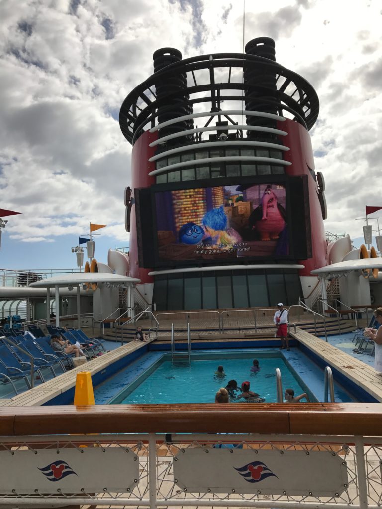 Kids and adults will love watching Disney movies out on the pool deck